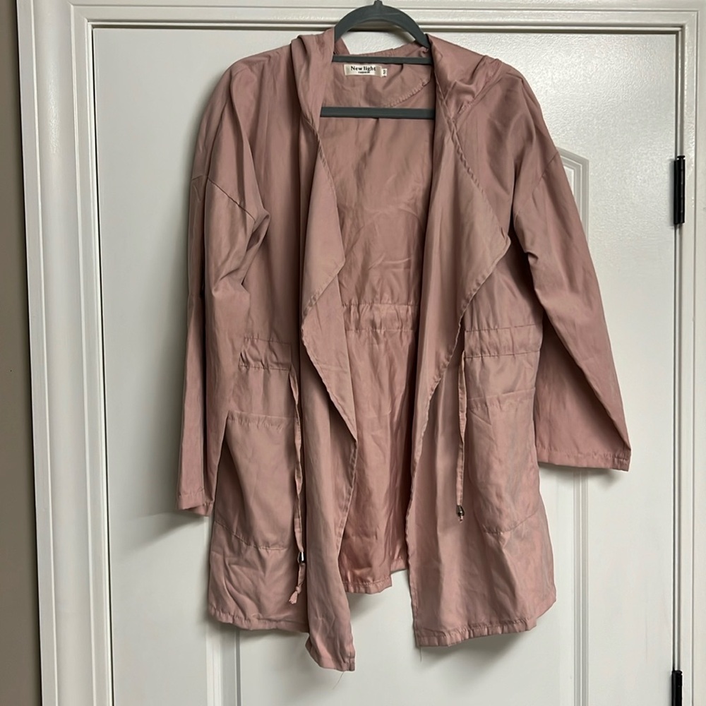 Light pink women’s raincoat